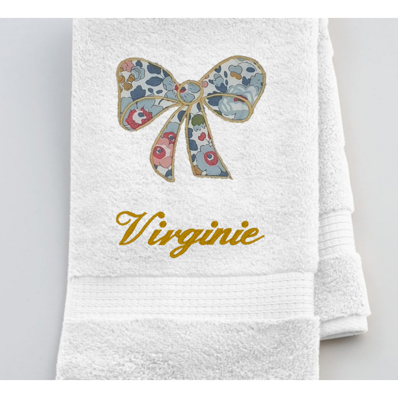 Serviette de toilette avec un noeud en liberty