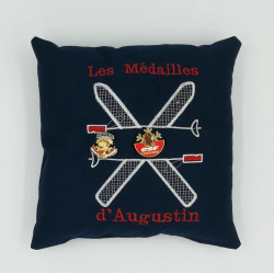 Coussin brodé pour médailles de ski