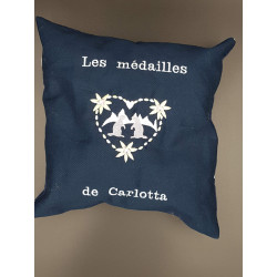 Coussin brodé pour médailles de ski