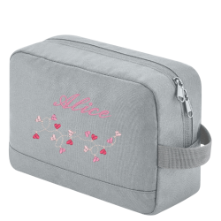 Trousse de toilette brodée dans notre atelier en region parisienne